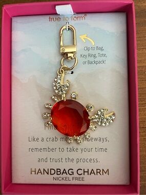 True to Form Gold Tone Crab Handbag Charm with Red Gem Accent